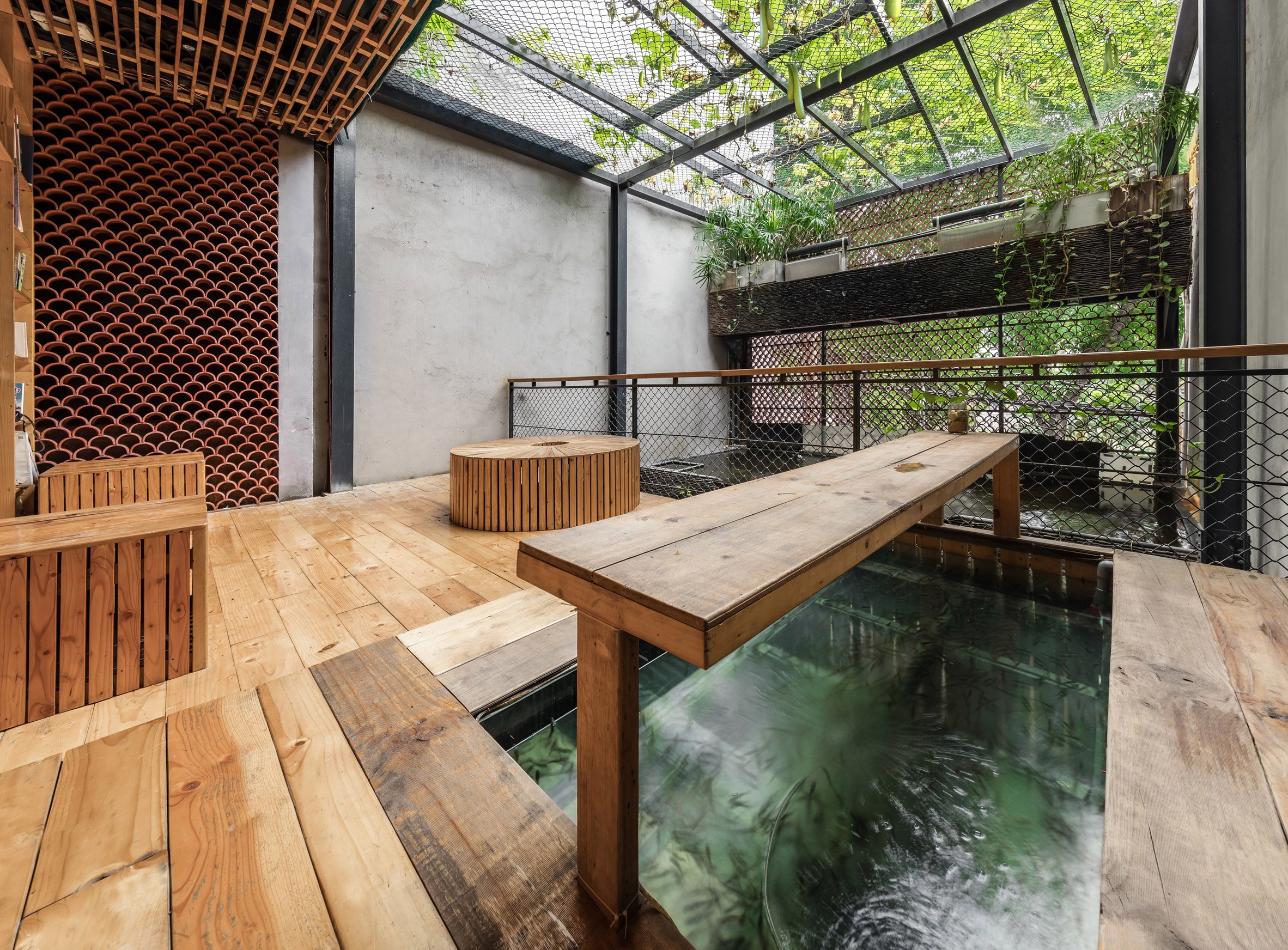 koi-farm-farming-architects-hanoi-vietnam-renovation-architecture_dezeen_2364_col_12.jpg